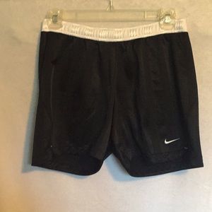 Black and white Nike running shorts